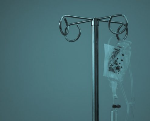 IV drip on a stainless steel stand — 5-day medical detox in residential rehab