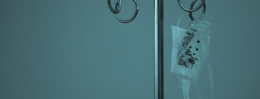 IV drip on a stainless steel stand — 5-day medical detox in residential rehab