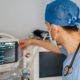 clinician monitoring a patient vital signs monitor during medically supervised detox