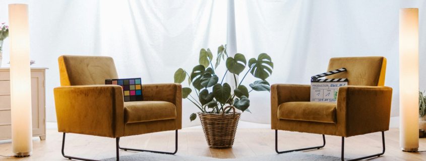 Two chairs in a living-room-style therapy space — EMDR trauma processing in residential addiction treatment