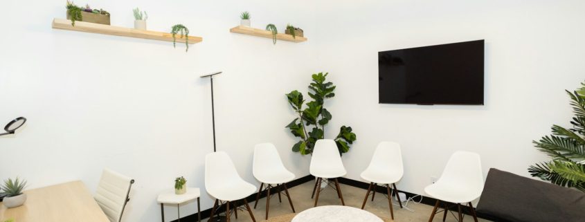 A modern intake waiting room with chairs — first week of residential addiction treatment