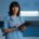 Nurse reviewing medical records at a computer during an overnight shift in a residential detox unit