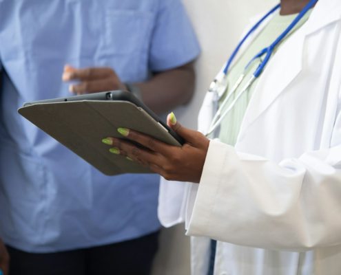 Clinician reviewing a stimulant use disorder relapse-prevention worksheet with a client during residential treatment in Northern California