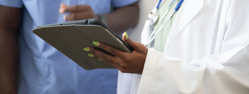 Clinician reviewing a stimulant use disorder relapse-prevention worksheet with a client during residential treatment in Northern California