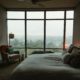 Peaceful bedroom in early morning light, representing the difficulty and importance of sleep in early addiction recovery