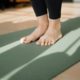 Yoga mat in a natural setting representing the integration of mind-body practices in holistic addiction treatment